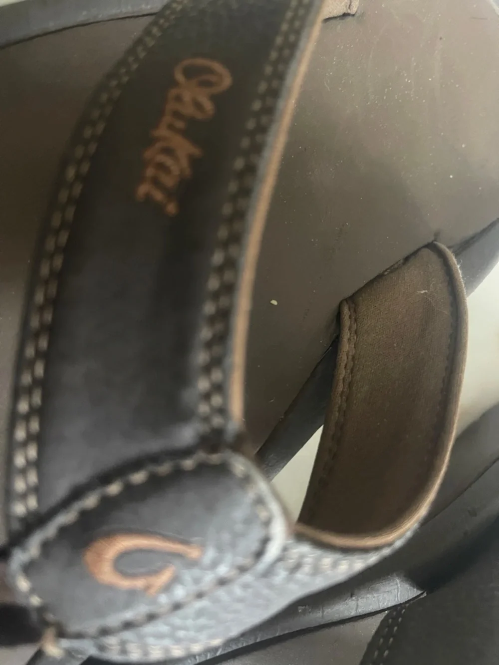 OluKai Dark Brown Leather Thong Sandals with Tan Stitching